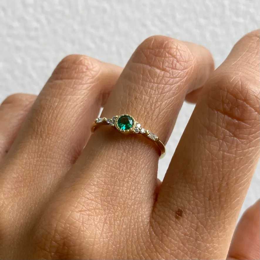 Emerald Round Poeme Ring